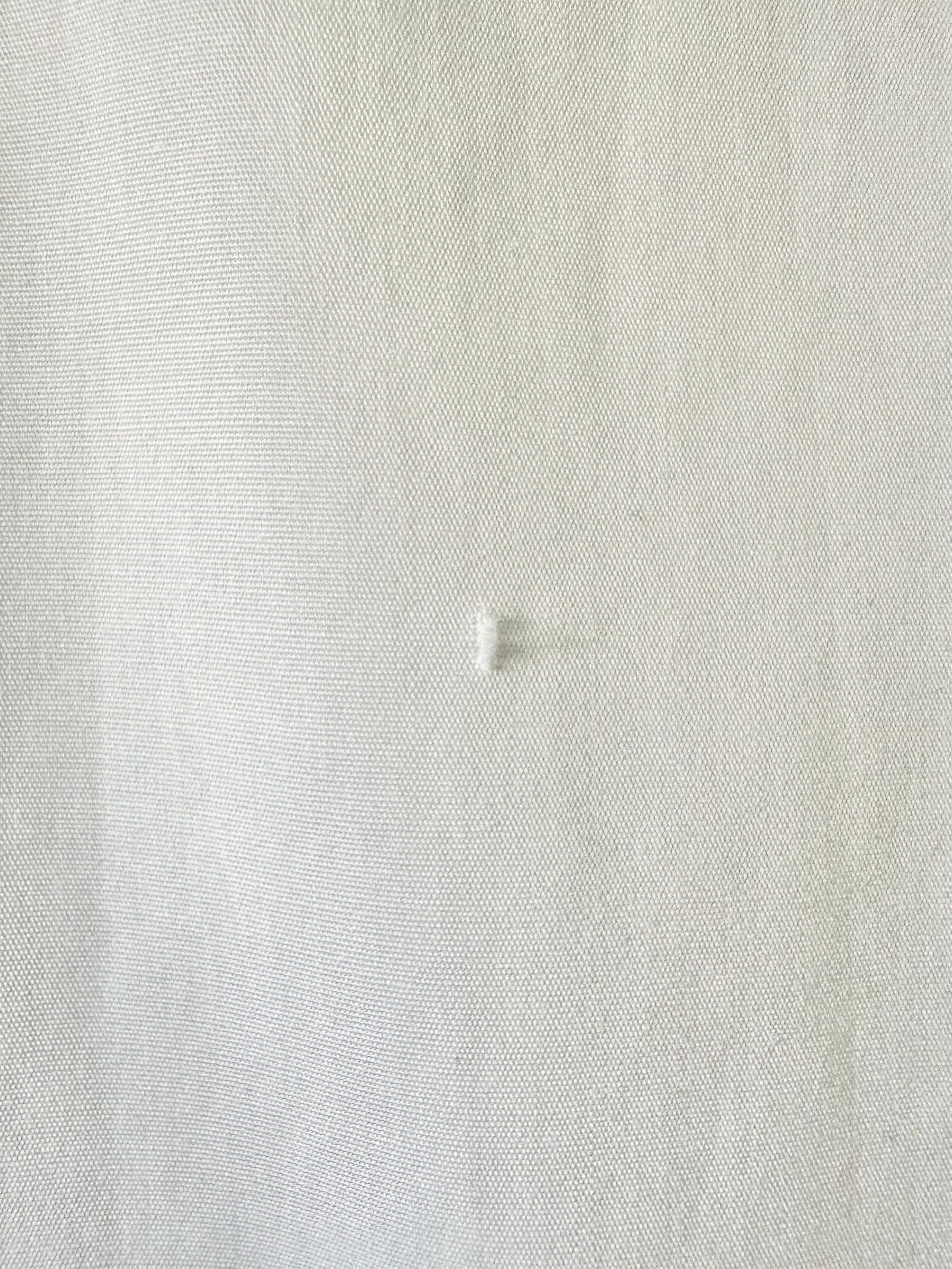 Close-up of a textured white fabric surface