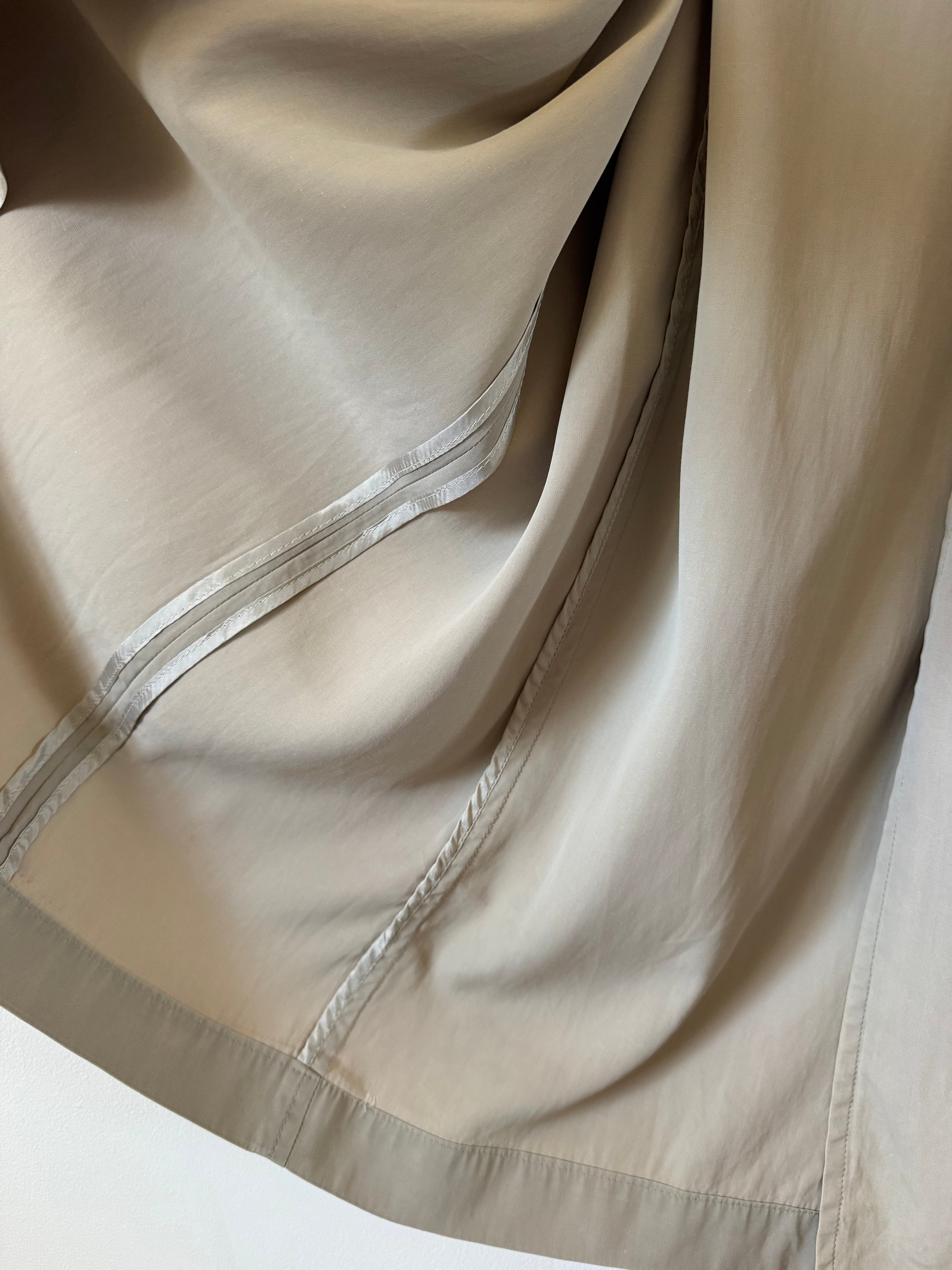 Close-up of inside trench coat.